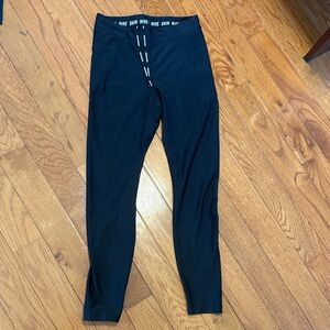 Women’s Nike pants with pockets, 24.5 inches